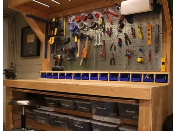 Garage workbench with pegboard and bins